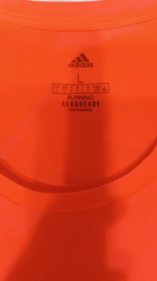Camiseta deportiva Adidas sin mangas naranja