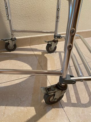 Silla WC y Ducha con reposapiés abatible.
