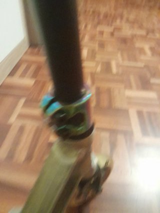 Patinete freestyle negro  plateado rudas arco iris