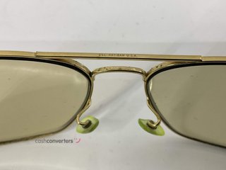 gafas de sol caballero/unisex rayban dorada