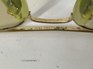 gafas de sol caballero/unisex rayban dorada