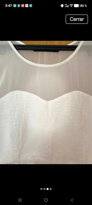 Vestido blanco con escote transparente