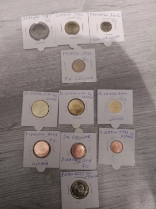 11 Monedas S/C España , euros 1999  y pesetas .