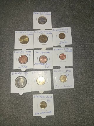 11 Monedas S/C España , euros 1999  y pesetas .