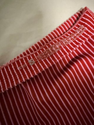 Top deportivo rayas fucsia y rosas