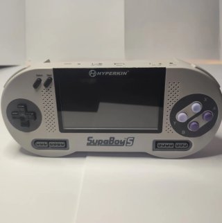 Supaboy S  super nintendo portátil + juego