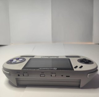 Supaboy S  super nintendo portátil + juego