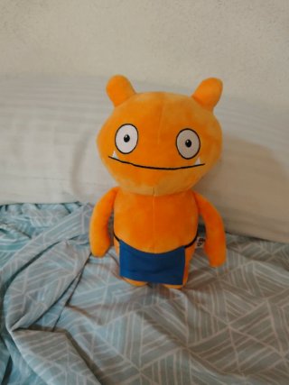 Peluche Naranja con Delantal Azul
