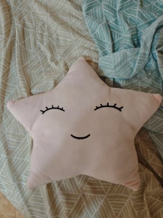 Peluche estrella rosa con cara