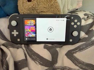 Nintendo Switch Lite Gris - Caja y Funda + SD 64GB