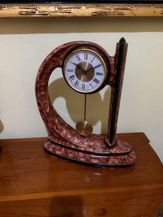 Reloj antiguo con candelabros