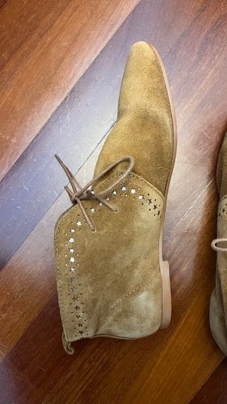 Botines ante Zara