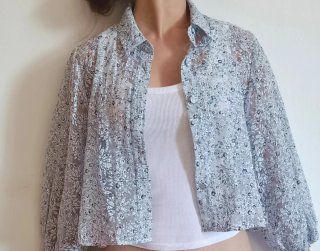 Blusa floral transparente