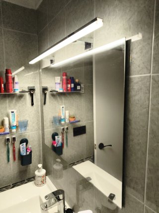 Espejo de baño moderno con aplique de luz incluido