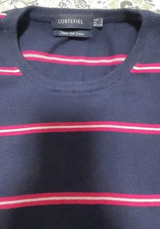 Lote de jerséis de hombre de Carhartt y Cortefiel,