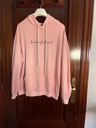 Sudadera rosa con capucha y bolsillo