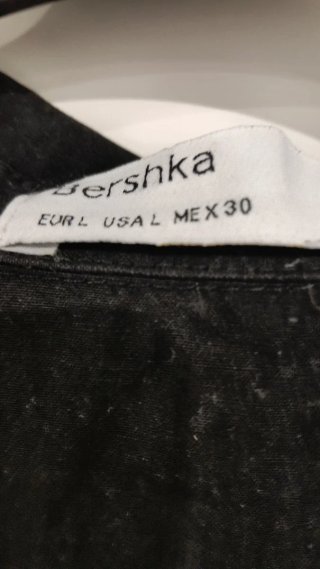 Mono negro de manga larga