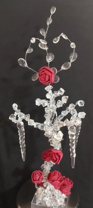 Rosa entre hielo y cristal