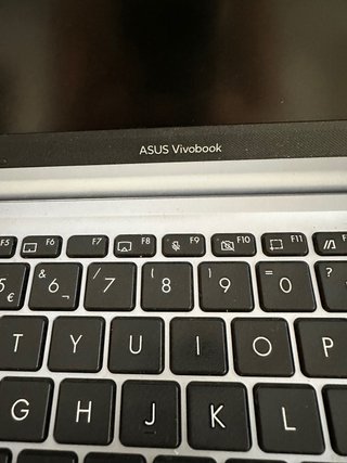 Portátil Asus Vivobook Plata con Cargador y Caja