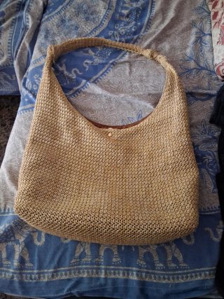 Bolso de mano tejido beige y marrón