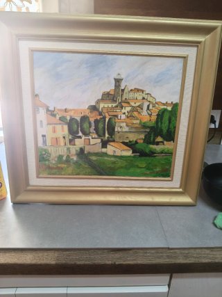 Cuadro paisaje pueblo con marco dorado