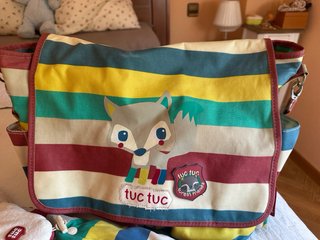 Saco y bolso Tuc Tuc a rayas.
