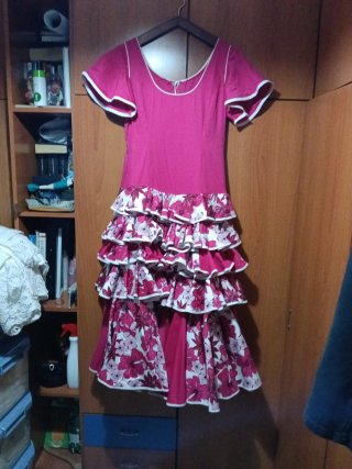 Traje de flamenca rosa volantes