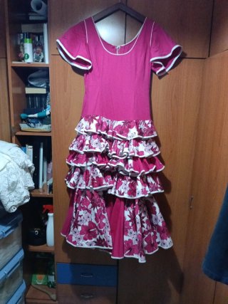 Traje de flamenca rosa volantes
