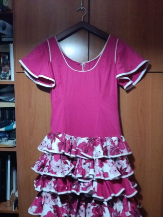 Traje de flamenca rosa volantes