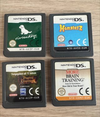 Lote Juegos Nintendo DS y adaptador.