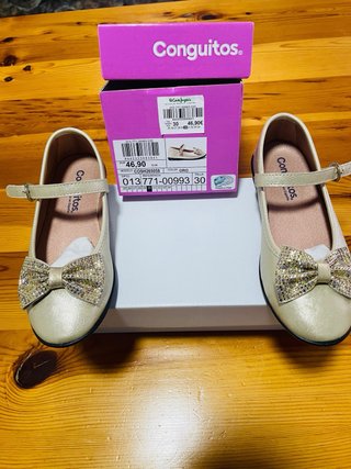 Zapatitos dorados Conguitos niña con lazo