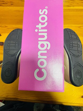 Zapatitos dorados Conguitos niña con lazo