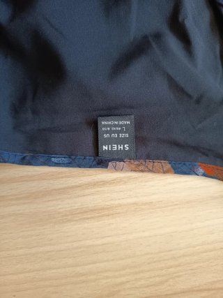 Blusa  hojas azul y naranja
