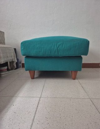 Puff de tela color turquesa