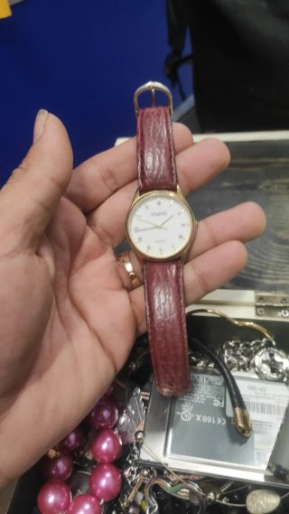 Reloj Dumond Dorado y Marrón