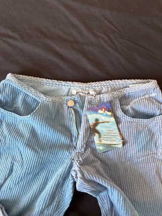 Pantalones acampanados azules de pana