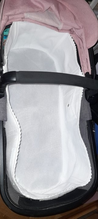 Carro de bebé gris y rosa