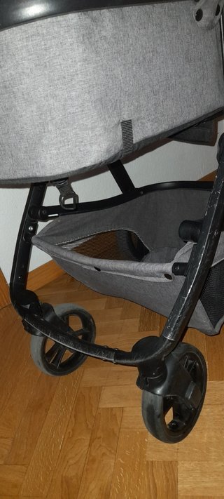 Carro de bebé gris y rosa