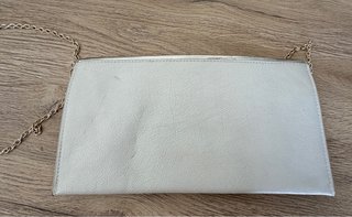 Bolso de mano plateado y blanco