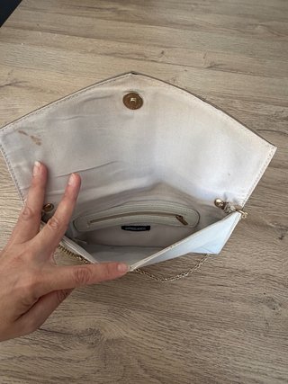 Bolso de mano plateado y blanco