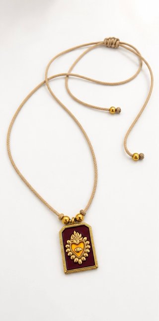 Collana con cuore sacro dorato