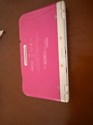 Nintendo 3DS XL Rosa con Cargador y funda.