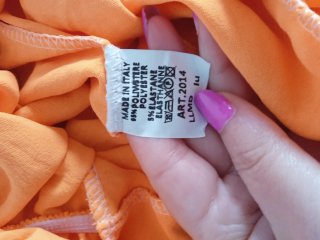 Mono naranja tirantes botones queda por el tobillo