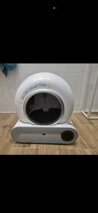 Arenero automático para gatos