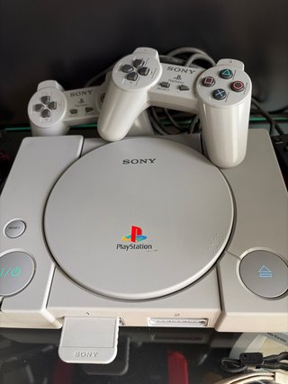Consola PS1 con 2 mandos y juego Rayman