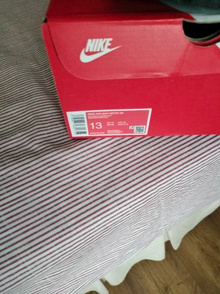 Zapatillas deportivas Nike negras y verdes