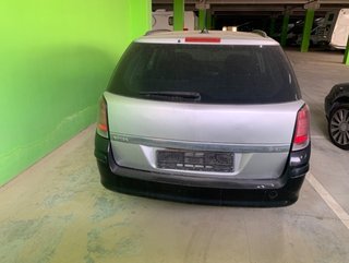 1799396 faro izquierdo opel astra h caravan