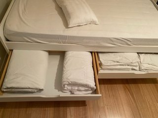 Cama nido blanca con cajones y colchones