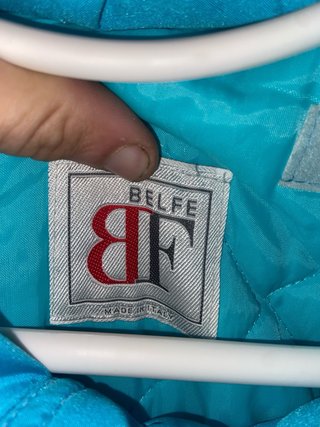 Chaqueta azul turquesa estilo bomber