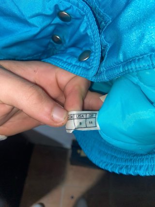 Chaqueta azul turquesa estilo bomber